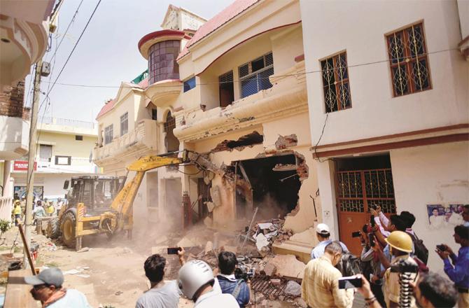 The bulldozer operation in Allahabad is being severely criticized