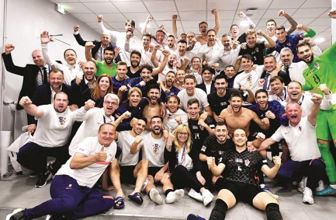 Croatia`s entire squad celebrates in the dressing room after defeating France.Picture:INN