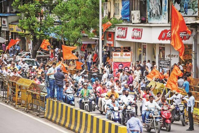 Shiv Sena participants in a motorcycle rally pass by Sina Bhawan in Shivaji Park..Picture:INN