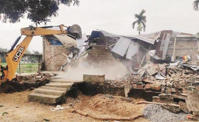 Police demolished the houses of the accused (on the right).Picture:INN