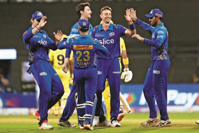 Congratulating Mumbai Indians player Daniel Sims on taking the wicket.Picture:INN