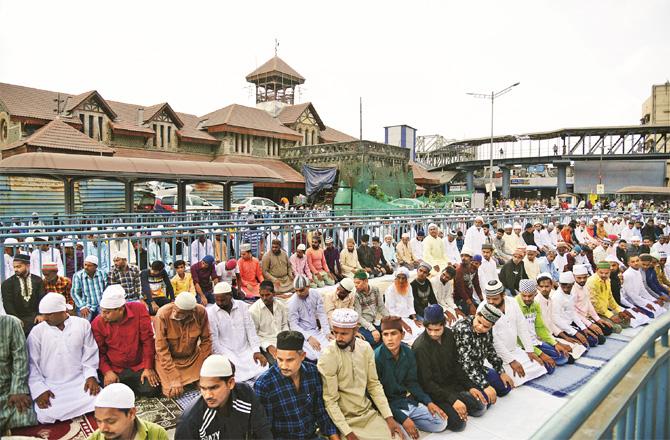 Scene of Eid-ul-Fitr prayers outside the railway station in Bandra Maghrib.