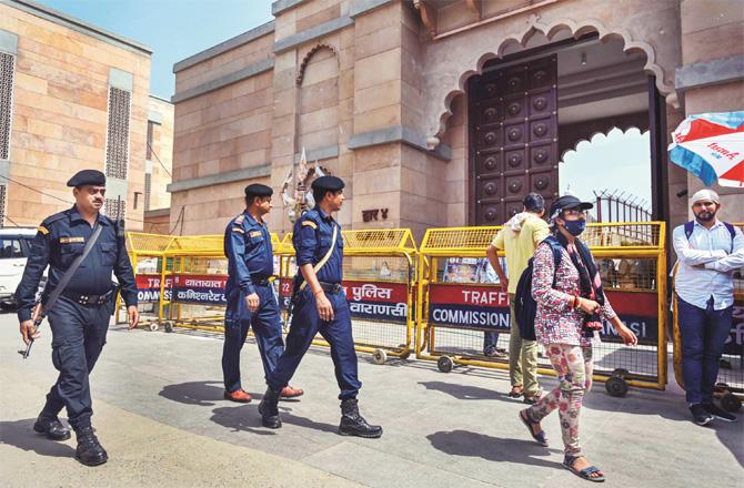 There is tight security outside Gyan Vapi Mosque and several barricades have been set up. (Photo: PTI)