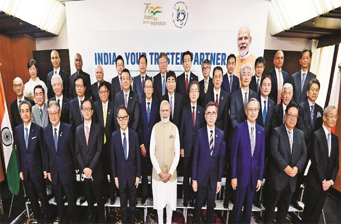 Prime Minister Narendra Modi can be seen with top executives and CEOs of two major Japanese companies