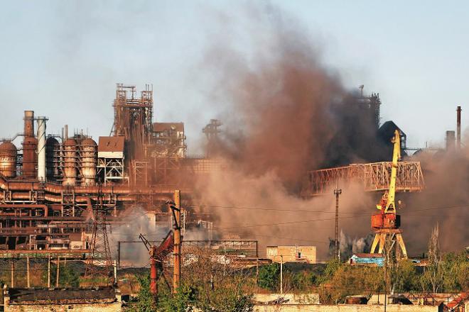 Smoke billows after the bombing in Mariupol.Picture:PTI/AP