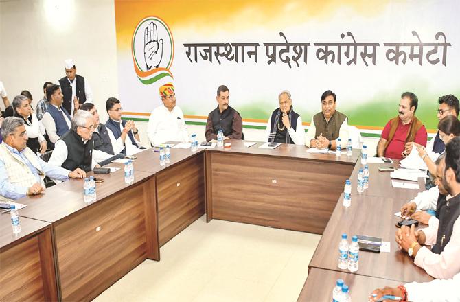 In this photo from Wednesday, Sachin Pilot can be seen with Ashok Gehlot at the Rajasthan Congress Committee meeting. (PTI)