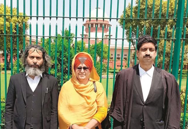 Charanjit Kaur with his lawyers at the Supreme Court .Picture:The Quint