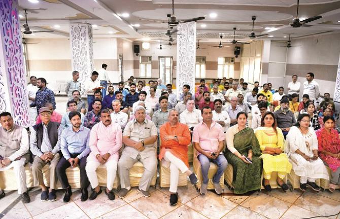 Delhi BJP president and other representatives listening to PM Modi`s Mann ki Baat programme .Picture:INN