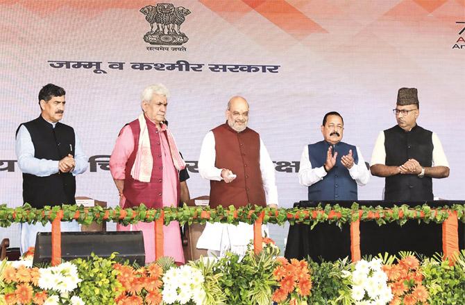 Union Home Minister Amit Shah along with Union Minister Jitendra Pradhan and LG Manoj Sinha