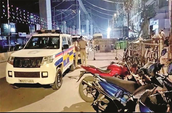 Police personnel investigating at the place where the firing took place in Kandivali.