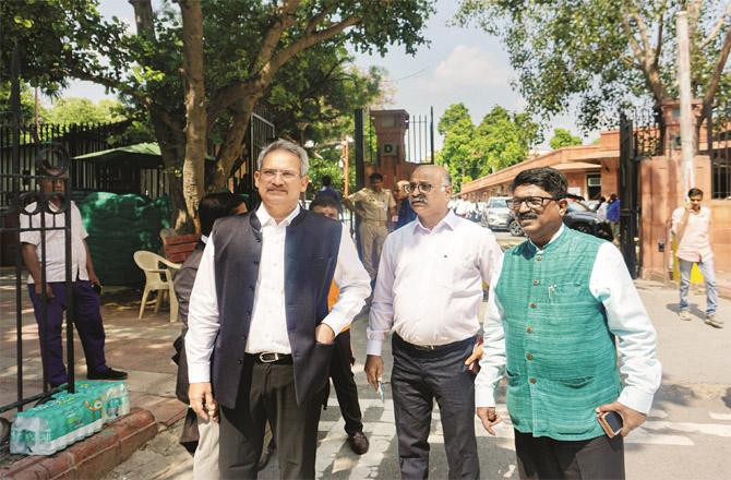 Subhash Desai, Anil Prab and Arvind Sawant of the Udho Group coming out of the Supreme Court.