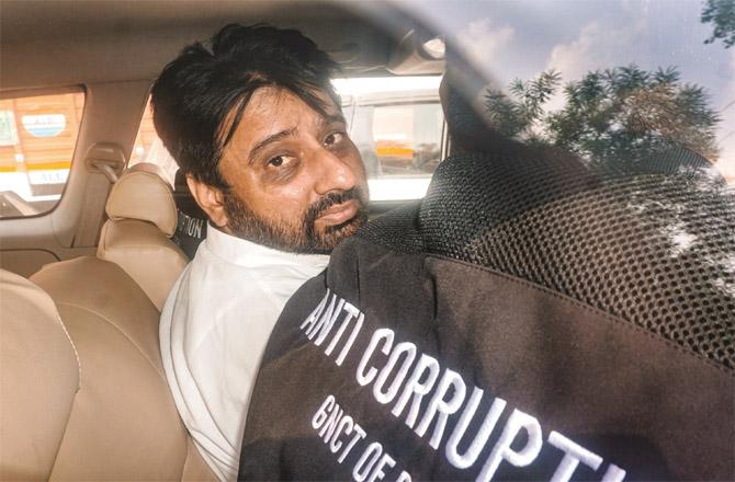 Member of Assembly Amanatullah Khan from Okhla was arrested and taken away by ACB officers. (Photo: PTI)