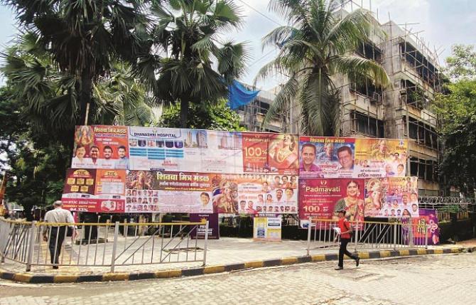 Action will be taken against those who put up hoardings and banners without QR code..Picture:INN