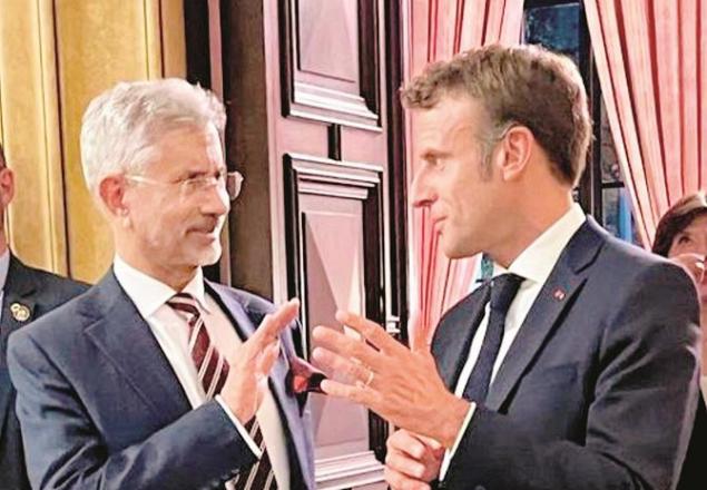 External Affairs Minister Dr S Jaishankar with Emmanuel Macron.Picture:PTI