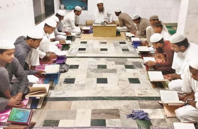Students can be seen reciting the Holy Quran in a seminary in the city.Picture:INN
