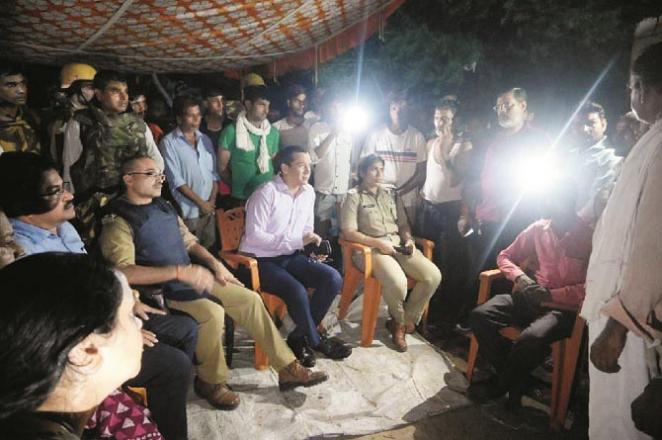  Officials of the police and district administration meeting the local people and the families of the deceased.Picture:INN