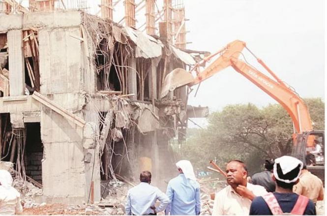 The scene of the demolition of an illegal building constructed on waqf land.Picture:Tweet