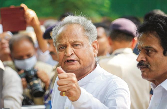 Ashok Gehlot after meeting Sonia Gandhi. KC Venugopal can also be seen in the picture. (PTI)