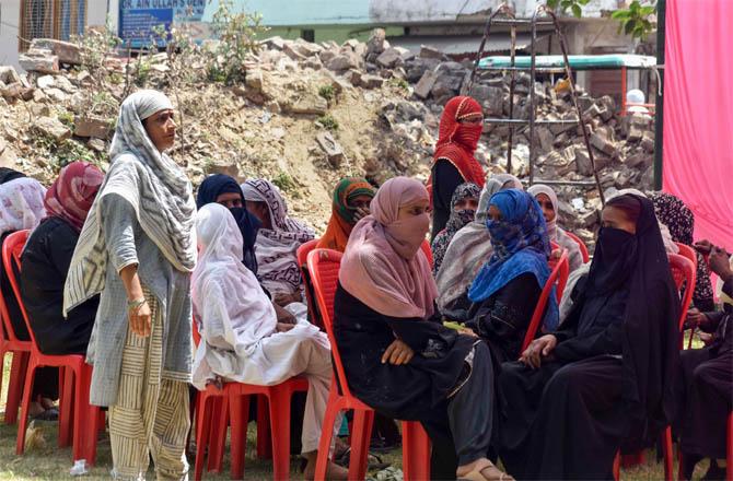 On the news of Asad Ahmed`s death, women reached Atiq Ahmed`s residence in Allahabad to pay their respects