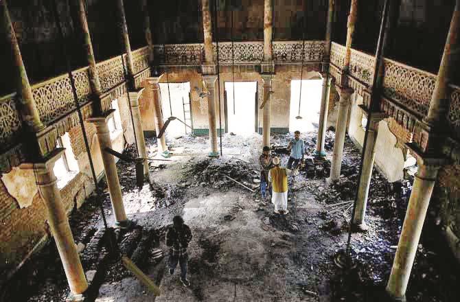 Interior of Madrasah Azizia after being set on fire. (The photo was taken by Mir Faisal, a journalist associated with Maktoob Media, which is being widely shared on Twitter)