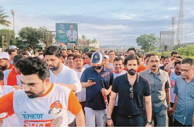 Amit Thackeray and party workers on the Mumbai-Goa highway during the `Jagri Yatra` against the government.Photo. INN