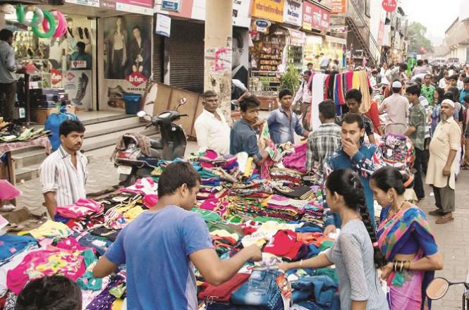 Various shops lining the footpath near Borivali station.Photo. INN