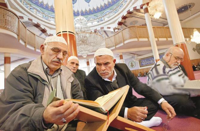 Recite the Holy Quran And consider its verses each verse has a lesson for us. Photo :INN