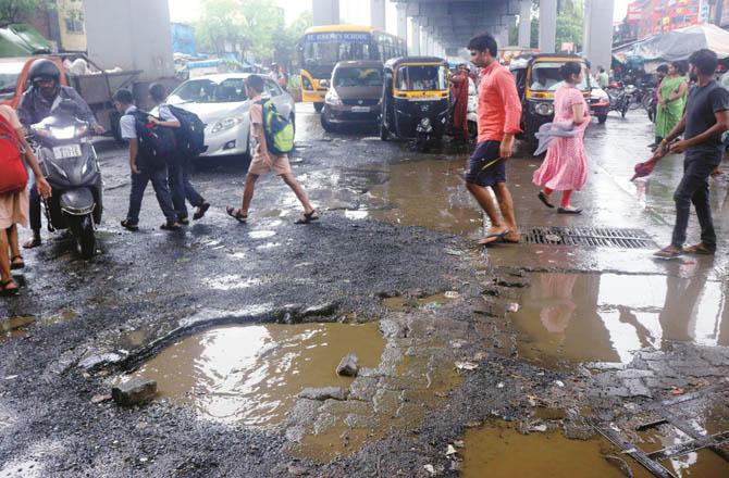 After the heavy rain, there were big potholes on the roads.