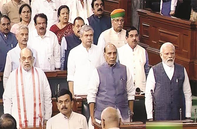 After the adjournment of the Lok Sabha, members recite the Rashtriya Geet. (PTI)