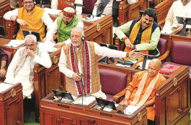 Yogi Adityanath and other members of BJP in the UP Assembly session. Photo: PTI