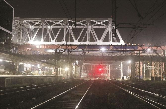 The girder laid for the open bridge is visible over the tracks near Andheri railway station. Photo: Anurag Ahir