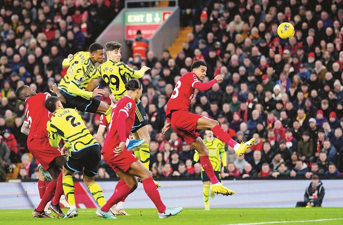 Players can be seen in action in the ongoing match between Liverpool and Arsenal. Photo: PTI