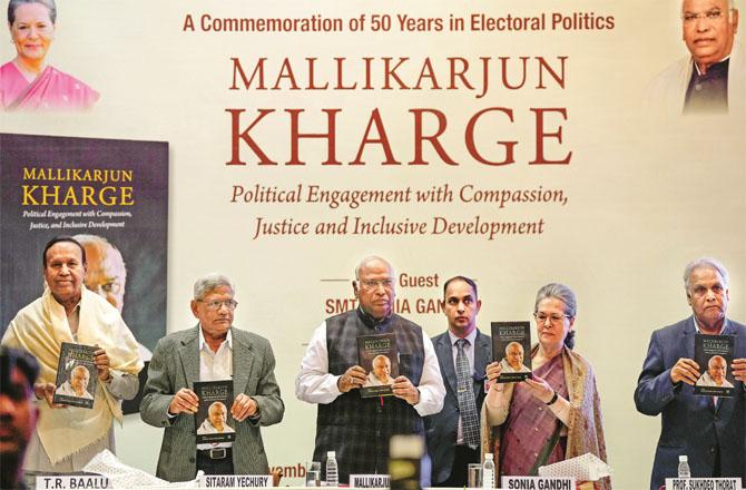 Persona Gandhi, Malkarjun Kharge and Sita Ram Yechury on the occasion of the release of the book. Photo: PTI