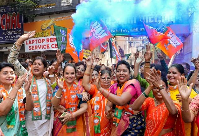 BJP workers and supporters celebrate the party`s lead (Pic: Agency)