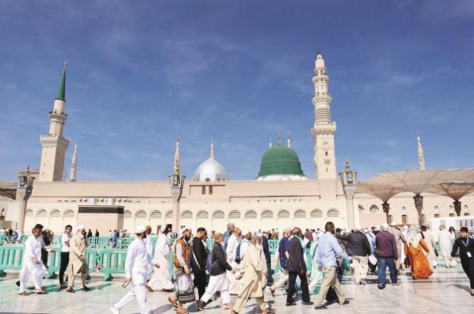 A view of the exterior of the Prophet`s Mosque where pilgrims can be seen walking towards the mosque. Photo: INN