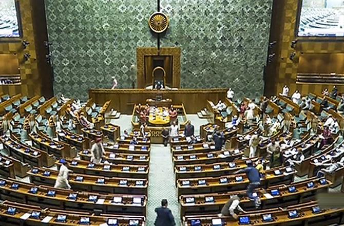 A scene of chaos in Parliament. Photo: PTI