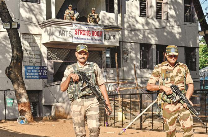 There is tight security outside the strong room set up to house the EVMs in Hyderabad. Photo: PTI