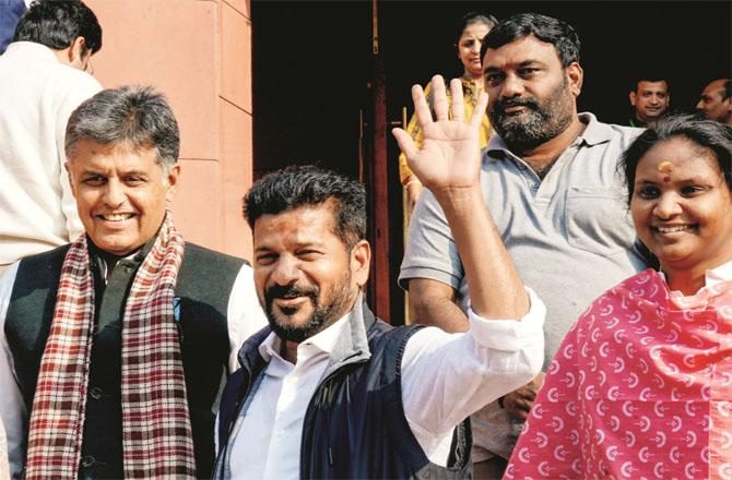 Revanth Reddy with Manish Tiwari outside Parliament (Photo: PTI)
