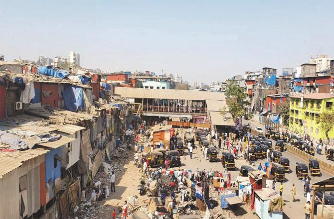 The huts on the eastern side of Bandra railway station were demolished by the railways. (Photo: Revolution)