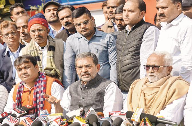 JDU Parliamentary Party Leader Upinder Kushwaha addressing the media at his residence