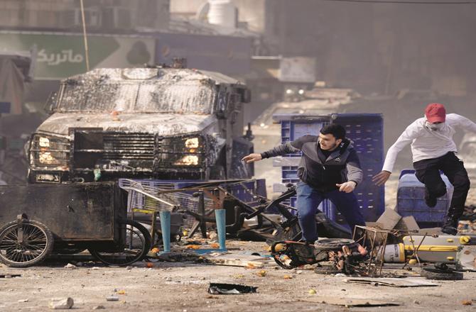 Palestinian civilians are seen amid tensions in Nablus. (AP/PTI)