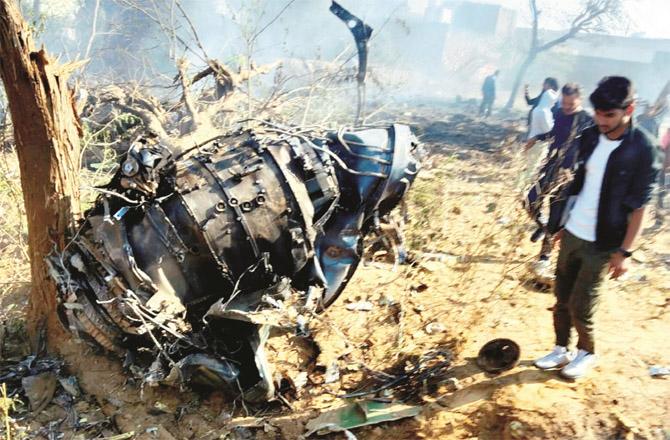 The wreckage of the plane can be seen after the accident in Morena. (PTI)