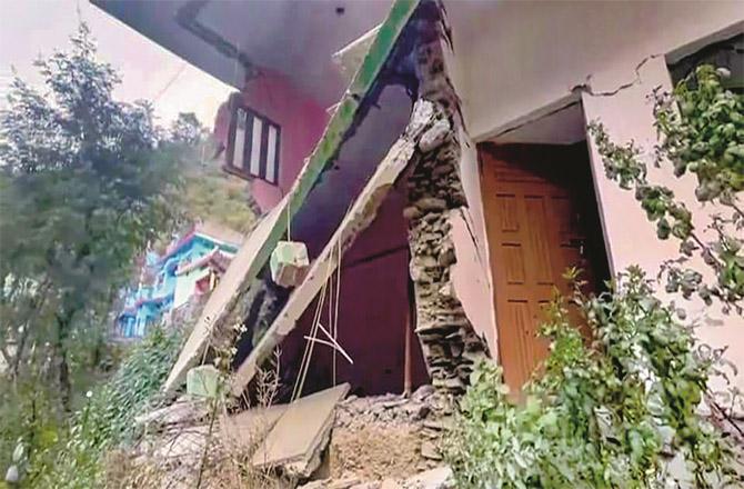 In another area of Uttarakhand, Karanprayag, houses are also in this condition (PTI).