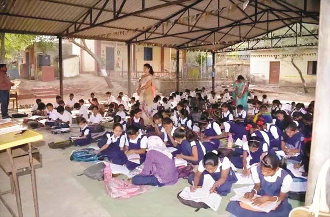 In some Zilla Parishad schools, students are forced to study this way due to lack of resources and facilities. File Photo