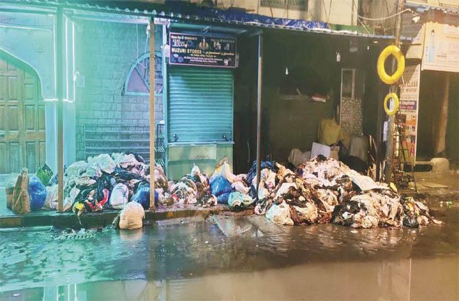 A pile of leather in front of the Maloni Jamia Masjid. As the businessman did not come, he had to be dragged by the BMC vehicle.