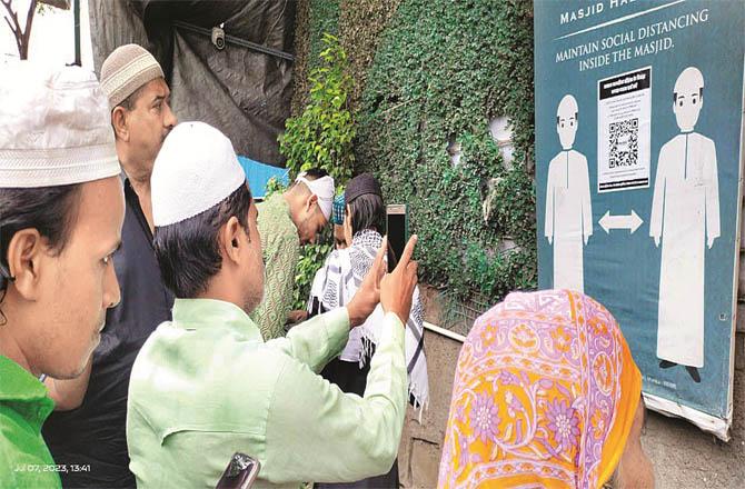 After Friday prayers, Muslims can be seen sending their feedback to the Law Commission by scanning the QR code posted outside a mosque.