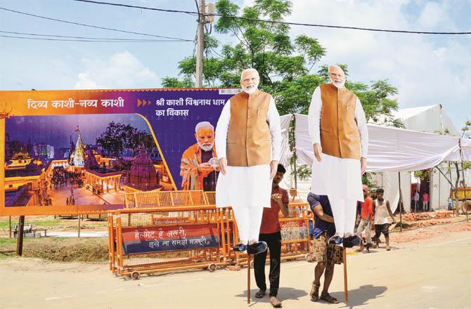 Big posters and cutouts of Prime Minister Modi are being put up in Banaras. (Photo: PTI)