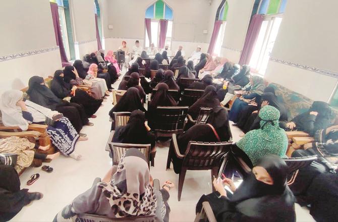 A scene of a meeting held for women in the guest house