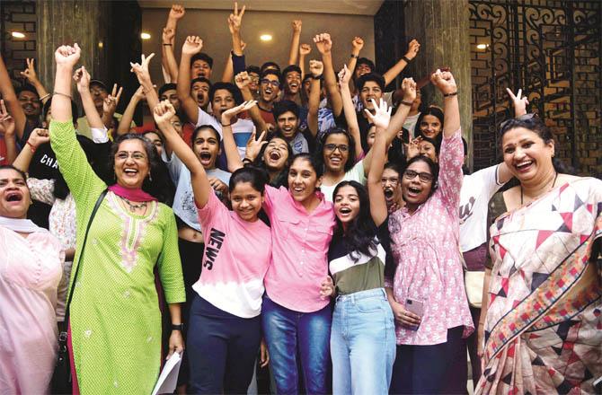 Students and teachers of Balmohan Vidya Mandir expressing happiness over the results