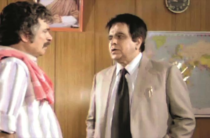 Qadir Khan with Dilip Kumar in a scene from the movie `Qanun Apna Apna`